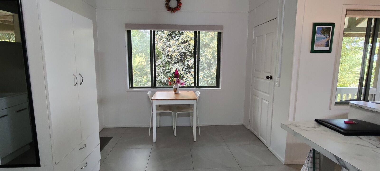 Kukupa dining nook with tropical garden outlook